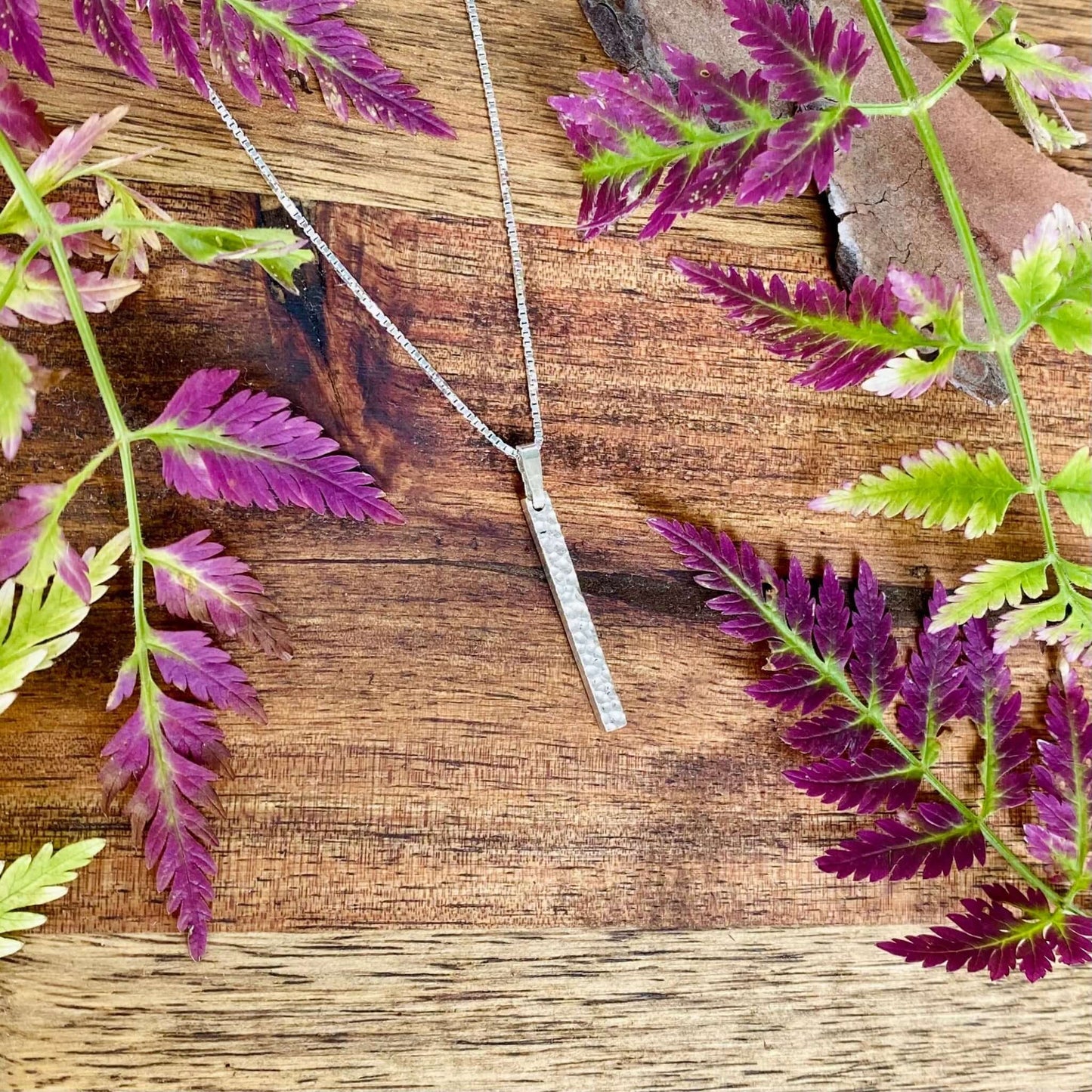 Rod-shaped silver pendant with structured surface, Necklace