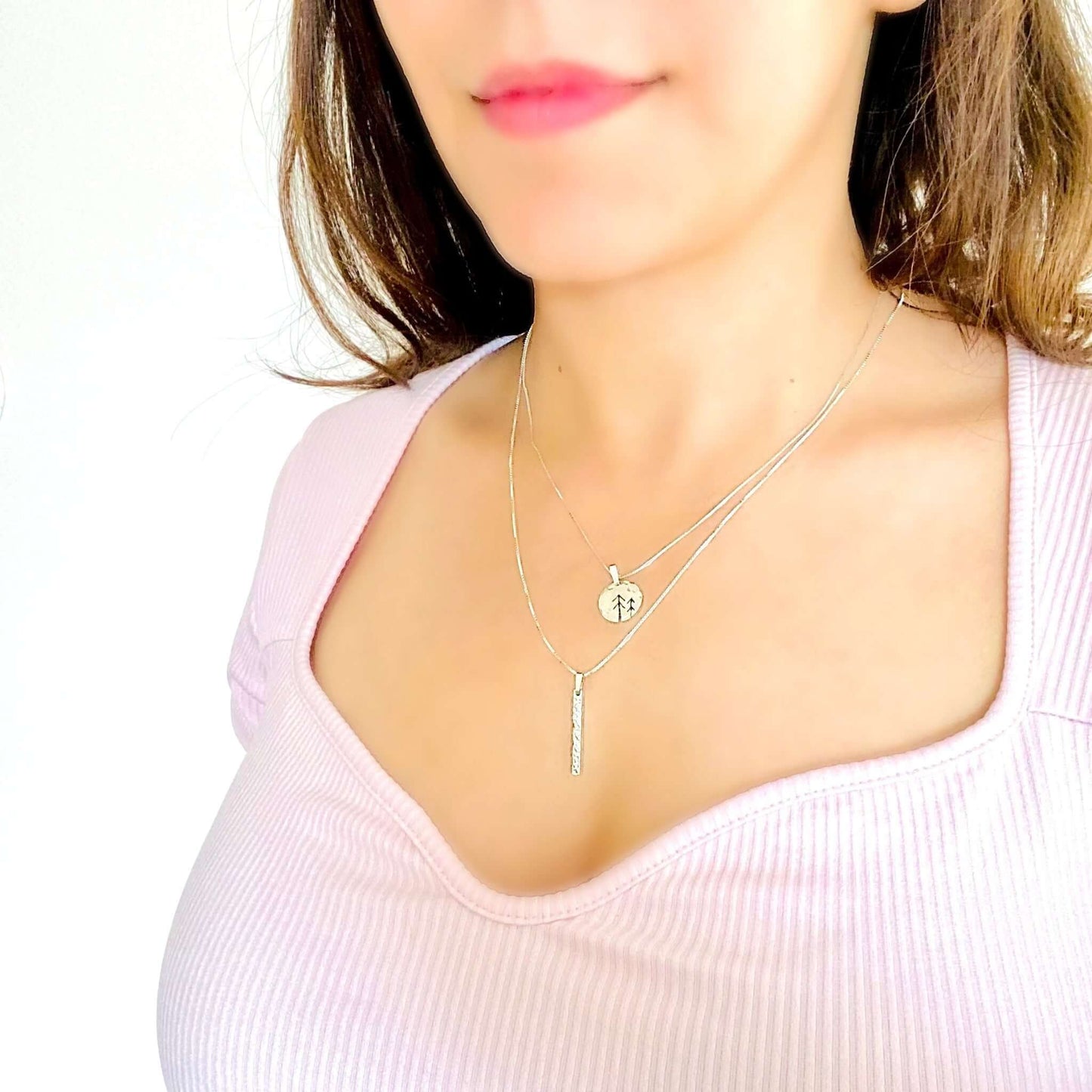 Rod-shaped silver pendant with structured surface, Necklace