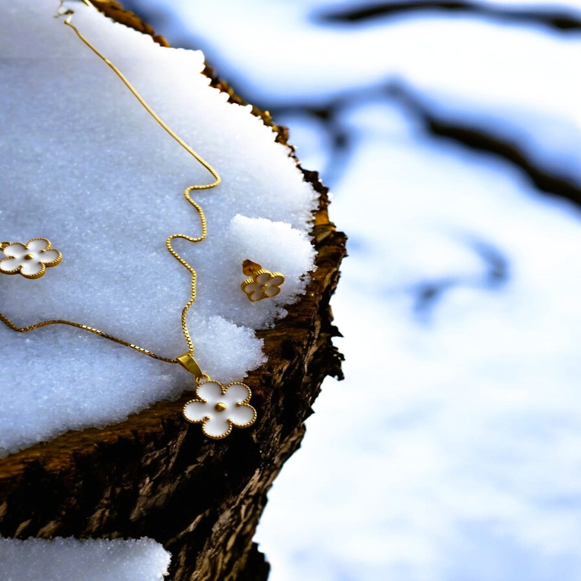 Blomma hänge silver guld